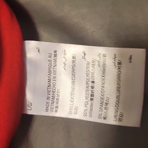 Red Mid knee length skirt with waistband and zipper in back for closure.. - Picture 5 of 5